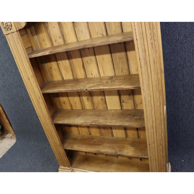 Vintage English scrubbed pine book case, solid, beautiful hand carved capitals and accents.