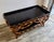 Enhance your space with this striking vintage Chinoiserie style two-tier tray-top coffee table, beautifully capturing the...