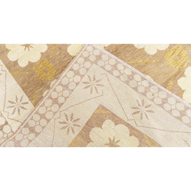 This modern traditional-inspired hand-knotted rug from Doris Leslie Blau blends classical design with contemporary warmth....