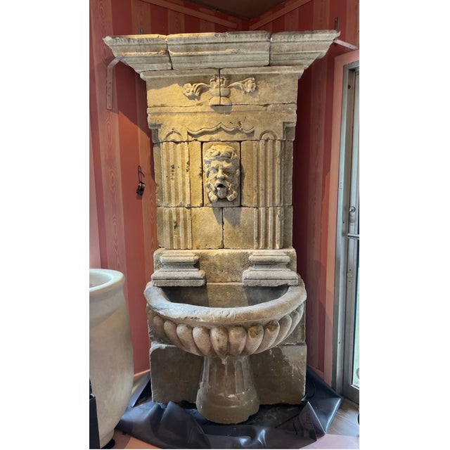 Incredible 18th-19th century hand carved limestone fountain depicting a bust of Poseidon, complete with coral in his hair....