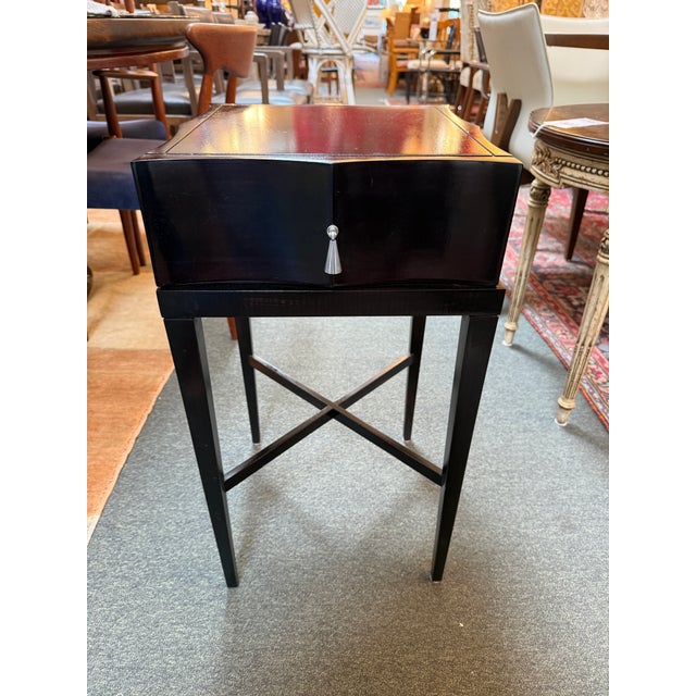 Design Plus Gallery presents the Archetype Side Table from Baker Furniture. The table has a finish that is gleaming, dark,...