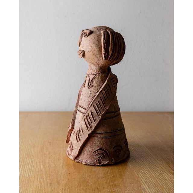 This vintage terracotta ceramic sculpture from the 1960s is a charming example of handcrafted studio pottery in a naive...