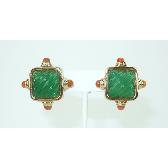 Classy and chic Francesca Romana clip on earrings featuring fluted emerald green glass set in gold plated metal and...
