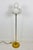 A midcentury floor lamp by Kaiser made in Germany in the 1960s. It is fascinating with its Space Age design and four ball...