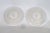 This beautiful Pair of Plates is made of glass. Due to the material and style, we believe this gorgeous pair was made by...