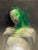 Seed by Josh Sorrell | Oil on Panel Abstract figure with green hues and blurred features. For Sale