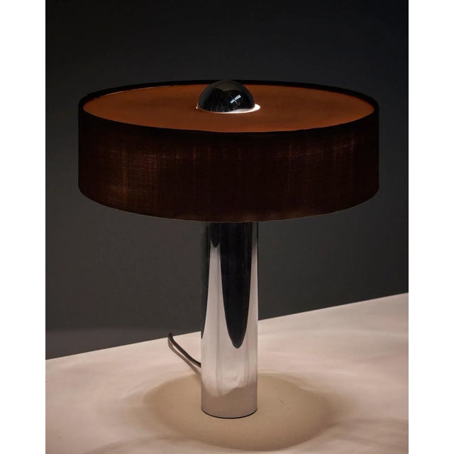 Introducing a remarkable Solid Chrome Table Lamp with a Brown Shade by Cosack, Germany. This stunning lamp combines the...