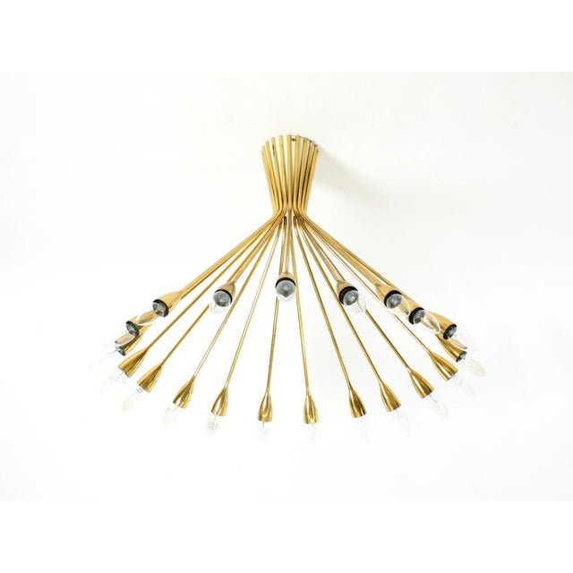 Beautiful, large mid-century modern brass sputnik chandelier with 20 arms. Manufactured in germany in the 1950s. stunning,...