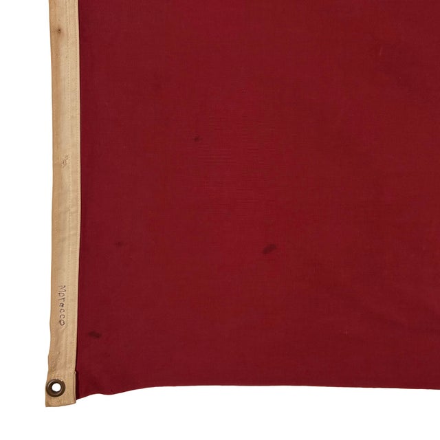 This vintage Moroccan flag is made from a cotton cloth with fully sewn star visible on both sides. Please note overall...
