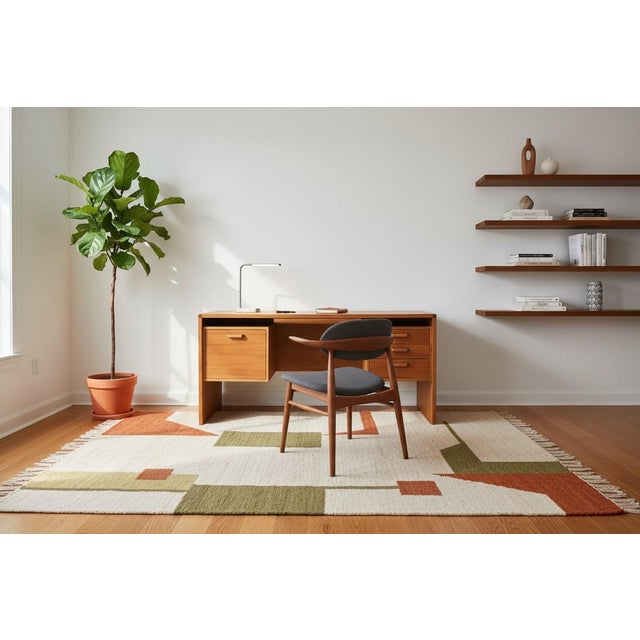 This 1960s Danish teak desk has been fully restored and refinished in a warm light walnut tone with a smooth satin lacquer...