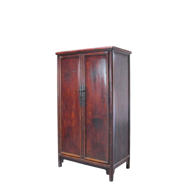 This 19th century armoire cabinet is built of solid catalpa wood using traditional Chinese joinery of tenon and mortise....