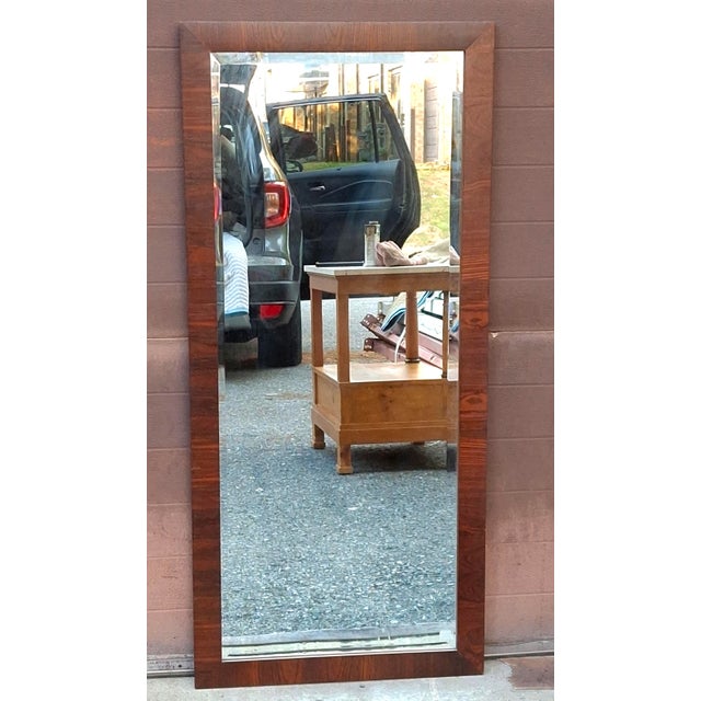 A Scandinavian Modern Style Rosewood Frame Mirror attributed to Milow Baughman. Dimensions: 21.25" in width, 1" in depth,...