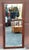 A Scandinavian Modern Style Rosewood Frame Mirror attributed to Milow Baughman. Dimensions: 21.25" in width, 1" in depth,...