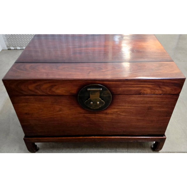Antique Mid-19th Century Chinese Polished Rosewood Trunk on a Custom Rosewood Stand Description: With Brass Mounts and...