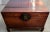 Antique Mid-19th Century Chinese Polished Rosewood Trunk on a Custom Rosewood Stand Description: With Brass Mounts and...