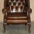 Vintage Pair of Chesterfield Chestnut Brown Leather Wingback Armchairs & Footstools For Sale In Dallas - Image 6 of 18
