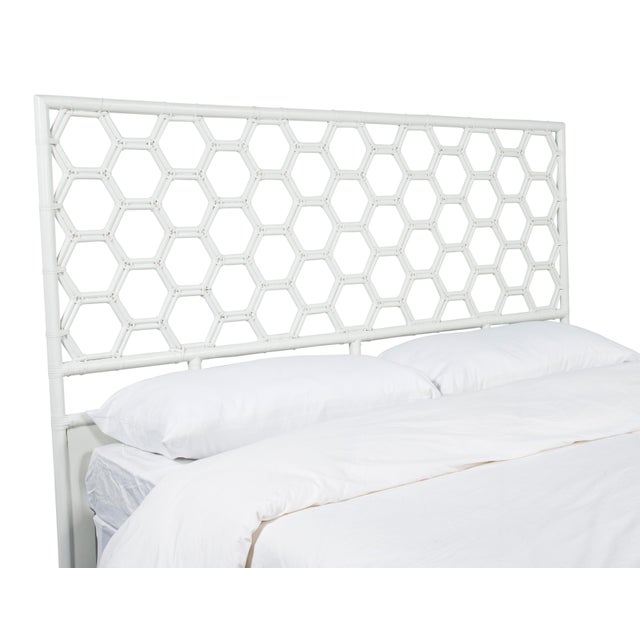 This headboard features classic Rattan design in a geometric pattern. Constructed of solid rattan and hand bound with...