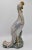 A large, whimsical vintage Asian ceramic phoenix figurine. This is a lovely bird with lots of beautiful pastel colors and...