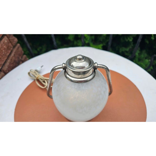 Art Deco nickel-plated brass small lamp or wall light, dimensions: height 23 cm, width 18 cm, base diameter 11.8 cm....