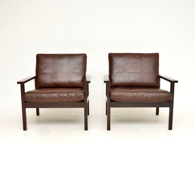 A stunning pair of vintage Danish leather armchairs. They were recently imported from Denmark, they date from the 1960’s....