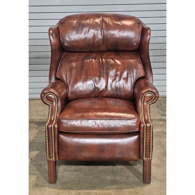 Store Item: Hancock & Moore Brown Leather Mahogany Chippendale Style Wing Chair Recliner Description: Chairs feature a...