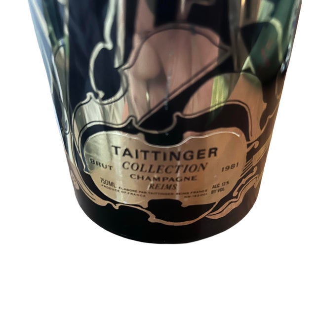 This is an unboxed 1981 Taittinger Collection Brut Champagne featuring a distinctive design by the French-American artist...