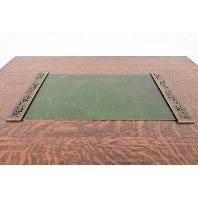 A gorgeous pair of Art Deco or Arts & Crafts period bronze "Grapevine" pattern blotter ends with a custom green leather...