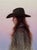 Evening Solitude by Derek Harrison | Oil on Linen Portrait of a woman in a hat. For Sale