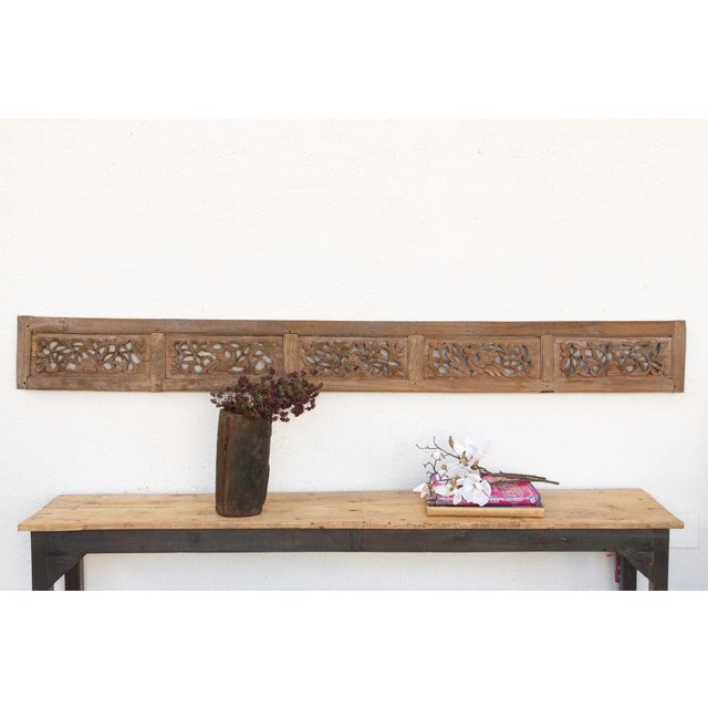 Invite a piece of profound history and breathtaking artistry into your home with this magnificent antique, finely carved...