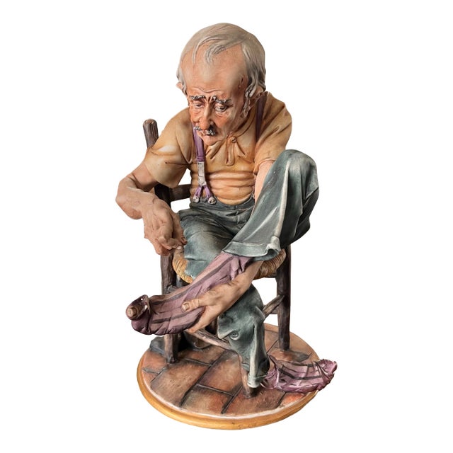 1970s Capodimonte 10" Man Mending Sock Figurine, Small Flaws For Sale