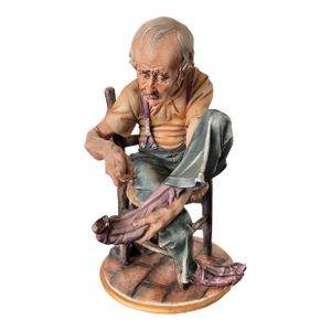 1970s Capodimonte 10" Man Mending Sock Figurine, Small Flaws