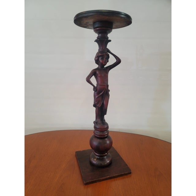 A wonderful carved lady table mahogany color, from Italy. Perfect statue or carving for an interesting wine room or side...