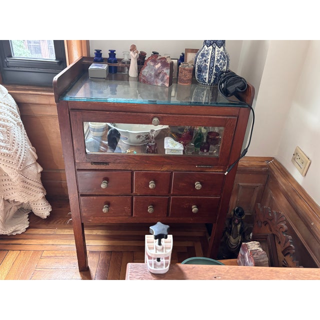 Antique oak medical or dental cabinet with glass display and drawers Professional office furniture, multiple small drawers...