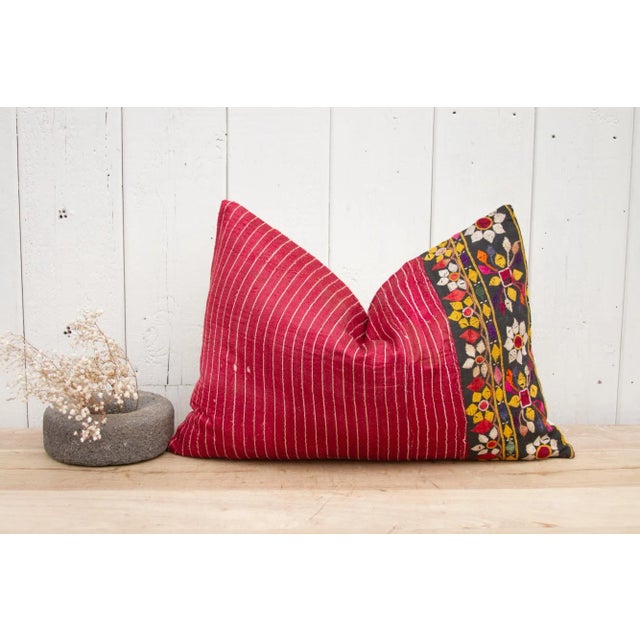 A beautiful Mashru silk lumbar pillow with a lovely embroidered tribal border of geometric and floral motifs. Mashru is...