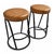 A sophisticated counter stool upholstered in warm nubuck leather featuring a classic tufted seat and back that bring...