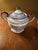 Very good vintage condition, remarkable for its age. This is a complete set including the highly elusive original lidded...
