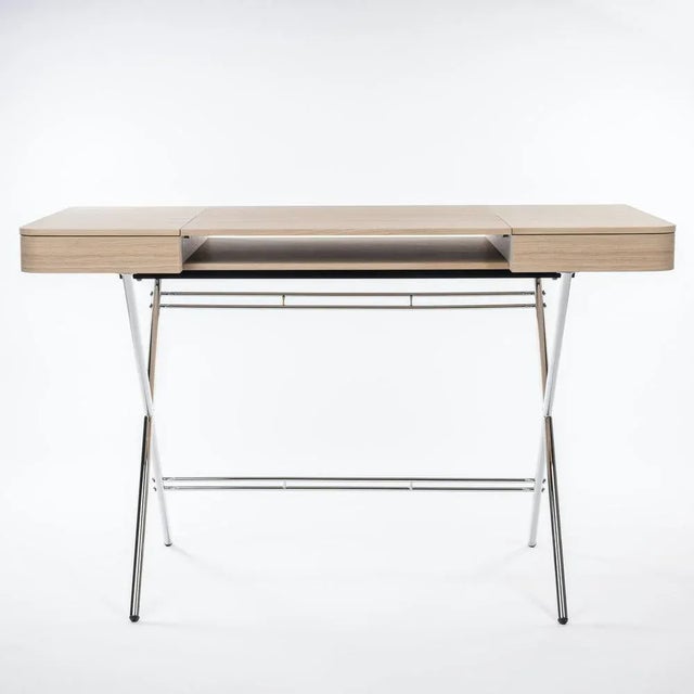 The Cosimo desk was designed by the architect Marco Zanuso Jr for luxury French furniture brand, Adentro Paris. The...