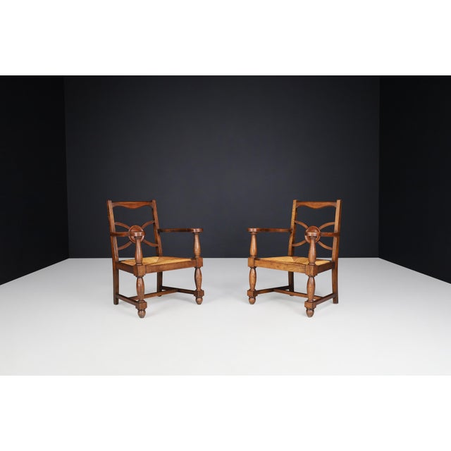 Art Deco Armchairs in oak and rush, France 1930s. These gorgeous art-deco armchairs were crafted in France, circa 1930....
