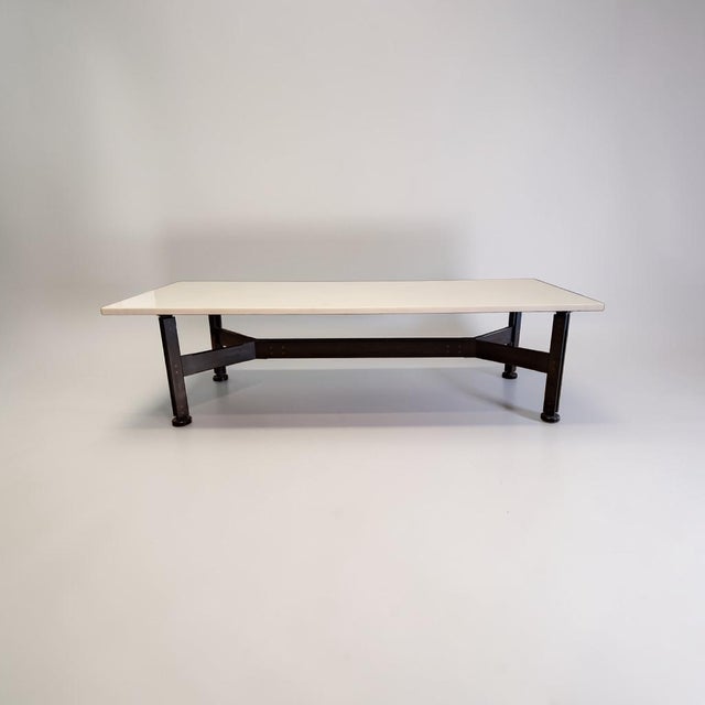 Large coffee table made of black-stained wood for the base and a white Carrara marble top. Designed in the style of Ico...