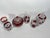 A beautiful museum-quality set featuring six pieces of 19th century Early American Pattern Glass (EAPG) with a rich ruby...