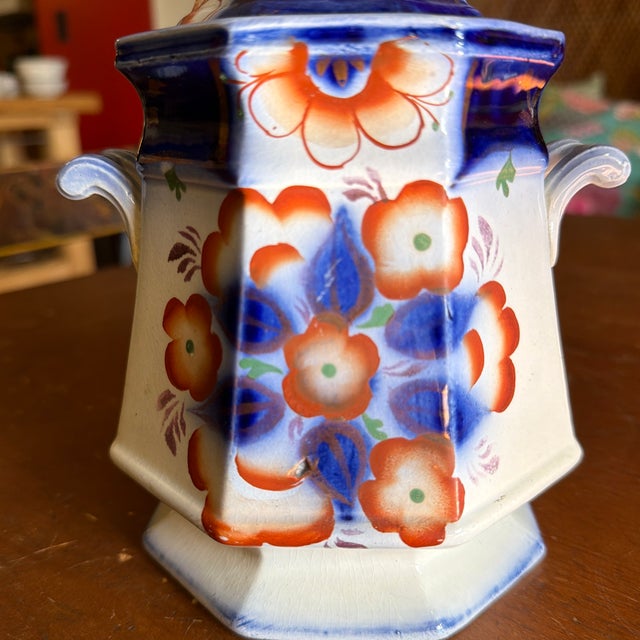 Antique Gaudy Welsh Crescent Pinwheel Flow Blue Covered Sugar Bowl, Circa 1840s A superb and finely preserved covered...