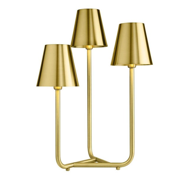 This elegant table lamp was made entirely in brass and features a triangular base made of three rods that stem upward to...