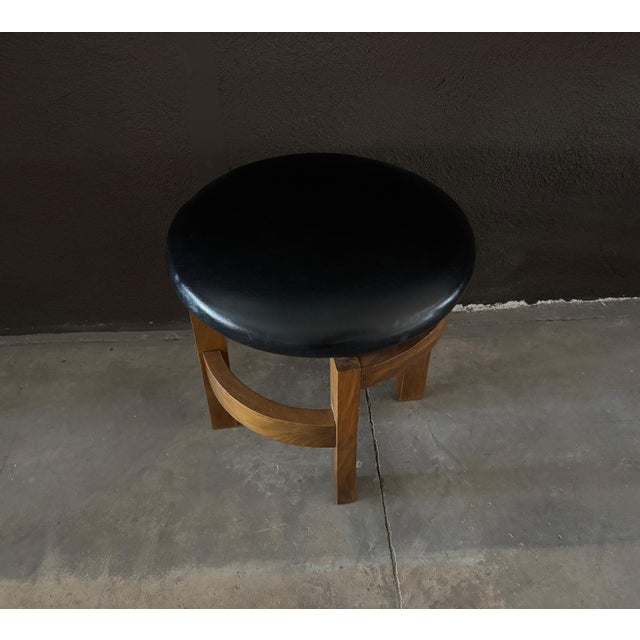 Nice set of 3 French art deco stools, with a geometric design, made of solid wood and leather covered seats, in very good...