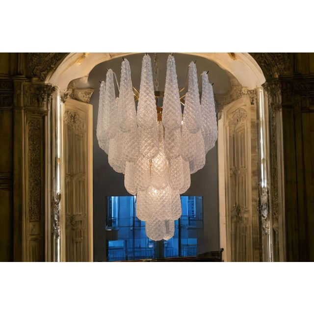 Fine Italian Murano chandelier made by 52 glass petals (transparent crystal, smooth outside, with crystal powder and then...