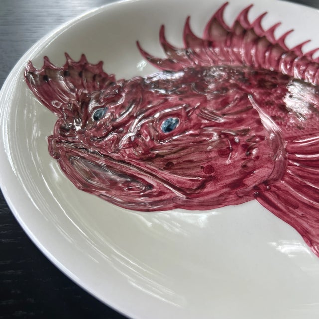 Individual plate made by Faience D’Art Proceram, France 1970. Part of a set of earthward with relief of sea creatures....