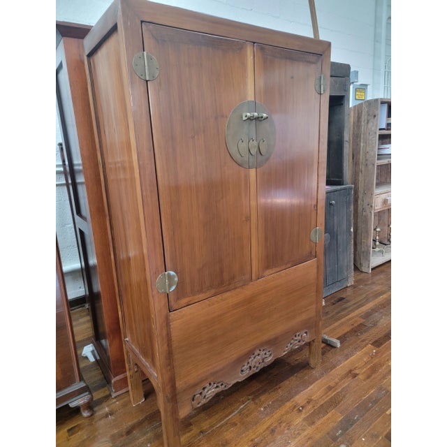 Chinese wedding cabinets, also known as wedding armoires were traditionally part of a bride's dowry and symbolized...