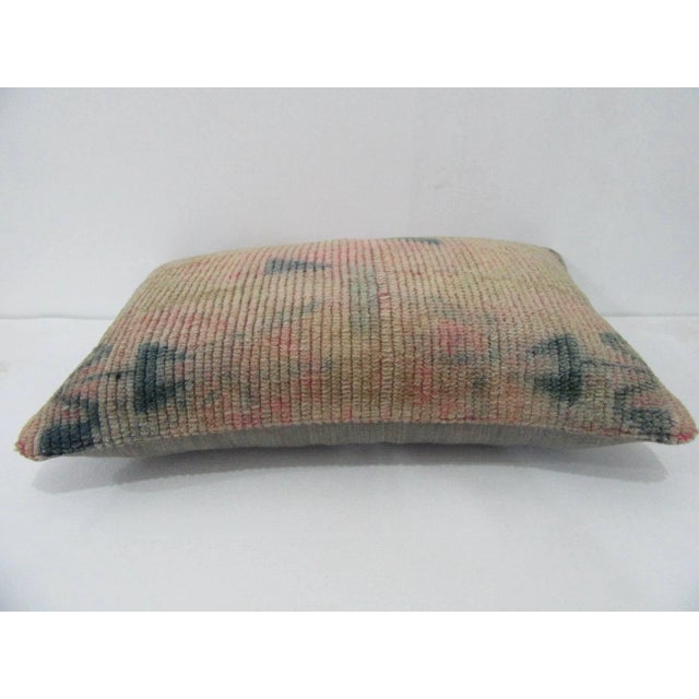 Decorative pillow cover made from a vintage Turkish handknotted rug. Backed with good quality cotton fabric. Pillow...