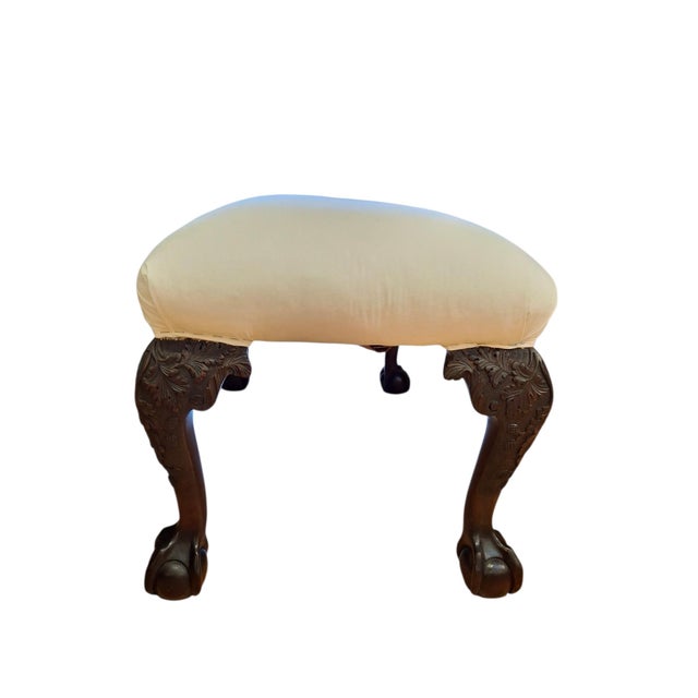 The glory of this piece, as with some ladies, is in its legs. Beautifully hand carved, each leg features a spray of...