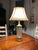 This striking mid-century modern table lamp features a brilliant column of thick, authentic German Dresden cut crystal....