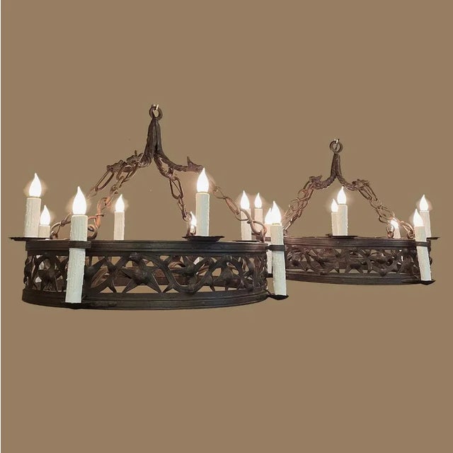 Pair Antique Country French Wrought Iron Chandeliers is a rare find indeed! Each has been completely forged by hand from...